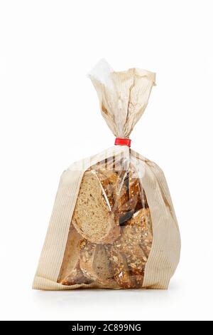 sliced multi grain bread in paper bag isolated Stock Photo