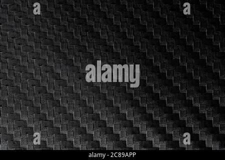 carbon fiber texture, lit from one corner Stock Photo