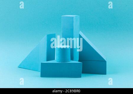 Blue geometric shapes on a blue background. Template composition for advertising, products. Stock Photo