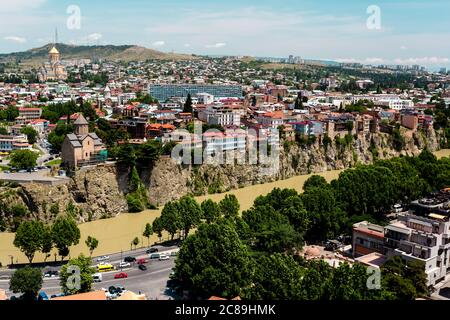 Tbilisi, Georgia - June 15, 2016: Old Tbilisi, the houses of Avlabari district on the rocky bank of the Kura River. Stock Photo