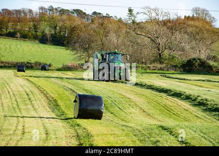 Baling silage, Castle Douglas, Dumfries and Galloway, Scotland. Stock Photo