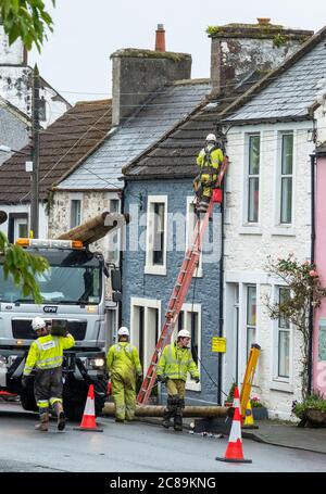 Keltbray electrical engineers replace overhead power cables in Wigtown town centre, Dumfries & Galloway, Scotland. Stock Photo