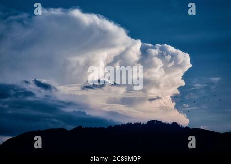 DE - BAVARIA: Dramatic cloud formation over Blomberg mountain near Bad Toelz Stock Photo