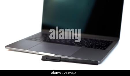 Top view white office desk table with computer laptop keyboard, pen and pencil. Office supplies isolated on white background with copy space Stock Photo