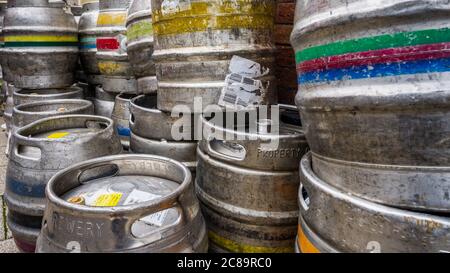 Beer Kegs, Beer Barrels stacked outside a public house UK Stock Photo