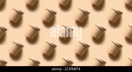 Craft paper soup cups on brown background. Ecological individual package. Zero Waste. Stock Photo