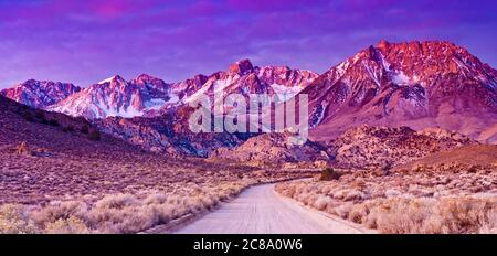 Basin Mtn (on right) in Eastern Sierra Nevada at sunrise in winter, from Buttermilk Road near Bishop, California, USA Stock Photo