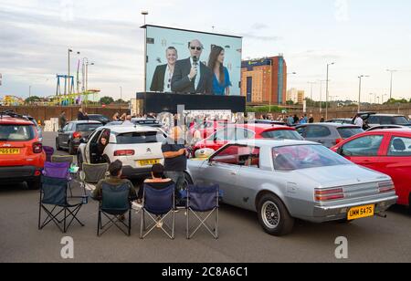 People watch the drive-in premiere of Break at the Brent Cross Drive-In at Brent Cross Shopping Centre in north west London. Stock Photo
