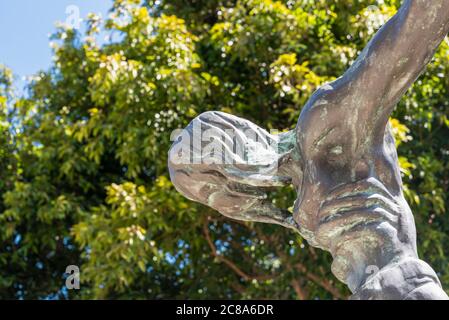Close-up on metal sculpture of Jesus on the cross Stock Photo