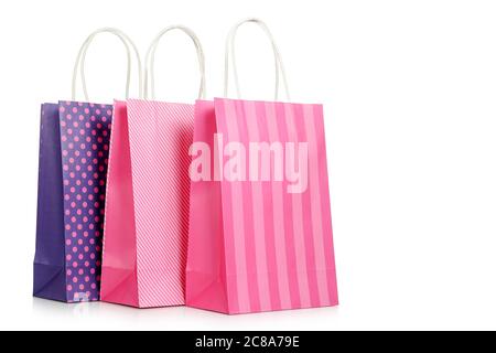 three paper shopping bags isolated on white Stock Photo