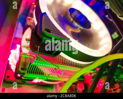 Modern computer air cooling with multi-colored led backlight-fans, cooling radiators, cables, boards, close-up, macro. Stock Photo