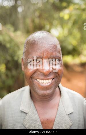 Close-up portrait of a smiling man in Makueni County, Kenya, East Africa. Stock Photo