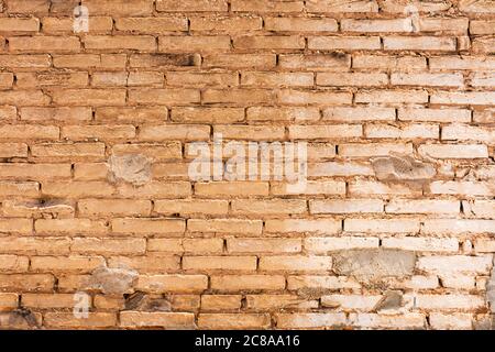 Wall of clay bricks of an old house. Image for backgrounds or designs Stock Photo