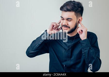 Bearded Muscular Man Wearing Black Tshirt Blank Snapback Cap Summer Time.Young Men Using Smartphone Headphones Looking Screen Smiling. Stock Photo