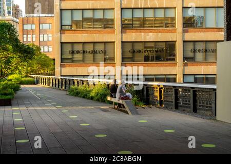 Social distancing reminders on the popular High Line Park in New York, seen prior to its reopening, on Wednesday, July 15, 2020. The High Line reopens on July 16 with entry at Gansevoort St only, timed entry tickets and travel only going north. (© Richard B. Levine) Stock Photo