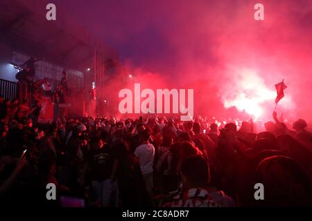 Liverpool fans celebrate outside Anfield. Stock Photo