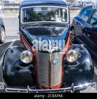 An Austin 8 car produced by The Austin Car Company between 1939 and 1948. Parked here in Howth, Dublin, Ireland. Stock Photo