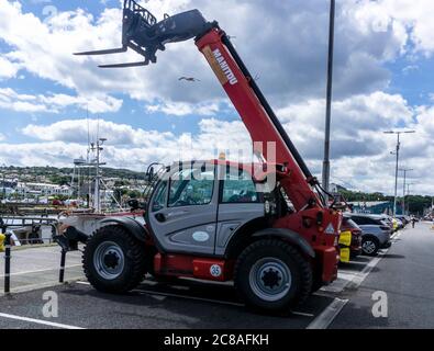 A Cherry Picker manufactured by Manitou parked in Howth Dublin Ireland. Stock Photo