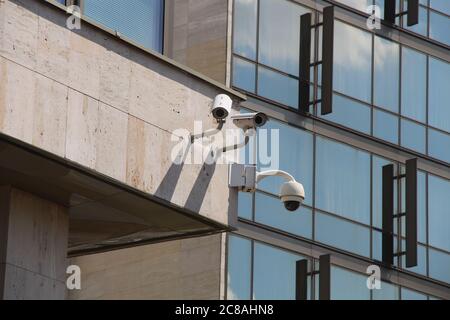 CCTV cameras installed on the exterior wall of a police building in Prague, Czech Republic Stock Photo