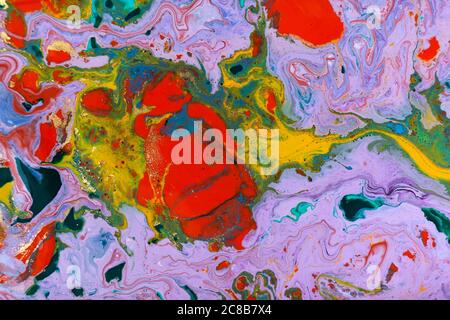 Mixed colorful inks background. Abstract paint texture with golden ...