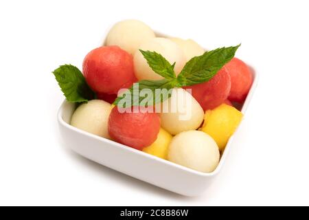 Fruit salad in a white bowl Stock Photo