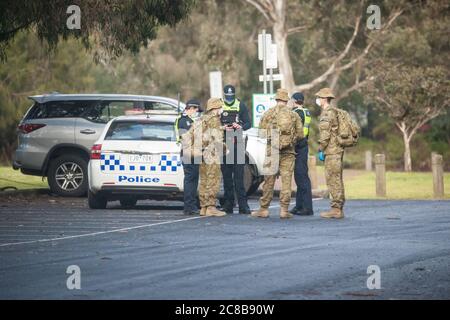 Melbourne, Australia 23 July 2020, Police and soldiers patrol Princes Park to enforce the mandatory mask laws that start today in an effort to control Covid-19 out breaks in the in Australia’s second most populous city Credit: Michael Currie/Alamy Live News Stock Photo