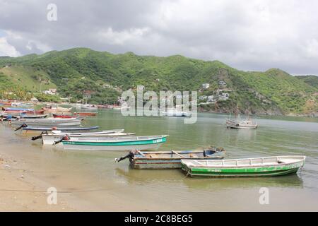 TAGANGA, COLOMBIA - JUNE 22, 2011: Taganga is a small fishing town located 7km away from Santa Marta on the Caribbean coast of Colombia Stock Photo