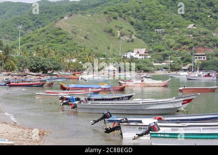 TAGANGA, COLOMBIA - JUNE 22, 2011: Taganga is a small fishing town located 7km away from Santa Marta on the Caribbean coast of Colombia Stock Photo