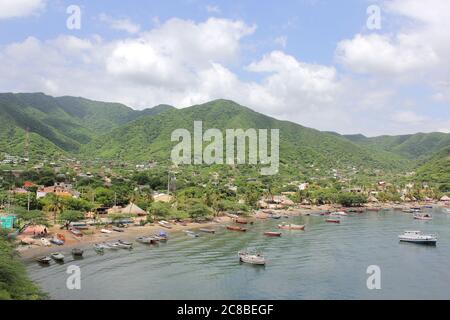 TAGANGA, COLOMBIA - JUNE 22, 2011: Taganga is a small fishing town located 7km away from Santa Marta on the Caribbean coast of Colombia Stock Photo