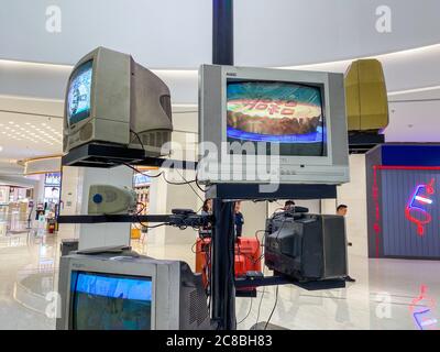 Zhengzhou, ZhengZhou, China. 23rd July, 2020. HenanÃ¯Â¼Å'CHINA-On July 13, a businessman set up an ''antique screen tree'' in Zhengzhou, Henan province. About 20 old TV sets from different eras were placed on the shelf to play cartoons, TV dramas and other films on a loop, attracting many citizens to watch, and the ''retro and nostalgic style'' appeared.These old televisions, both in colour and in black and white; There are tube TV sets, transistor TV sets, and integrated circuit TV sets. From the point of view of the period, are the last century's popular model of television. This setting is Stock Photo