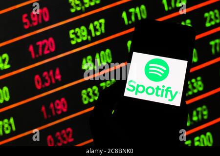 In this photo illustration a Spotify logo seen displayed on a smartphone. Stock Photo