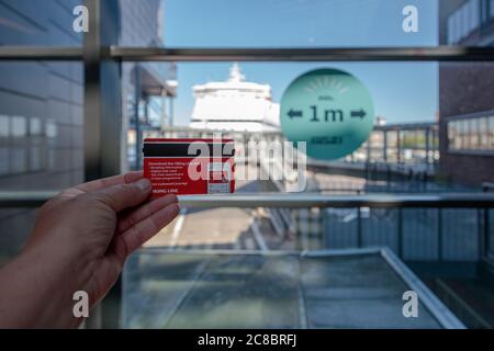 Helsinki, Uusimaa, Finland, July 20, 2020. A sign in the window informs people to stay at a distance from each other to avoid the spread of infection caused by the coronavirus COVID. High quality photo Stock Photo