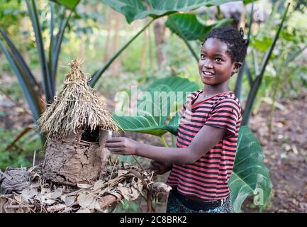 Jinka - Ethiopia - Africa, January 03. 2014:  Jinka Girl feeding Birds, Ethiopia, Africa Stock Photo