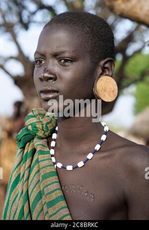 Ethiopia - Africa, January 03. 2014:: Portrait of Mursi Girl in Mago National Park, Ethiopia, Africa Stock Photo