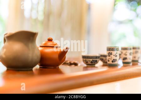 Woman serving Chinese tea in a tea ceremony. China tea ceremony Stock Photo