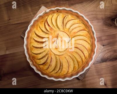 Fresh apple tarte on wooden table from above Stock Photo