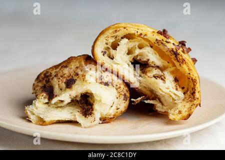Chocolate Croissant on a Plate Stock Photo