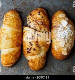 Three croissants on a plate Stock Photo