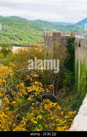 Castle wall seen from the outside in autumn. Stock Photo