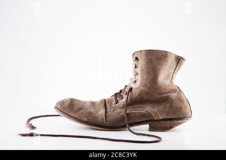 Vintage Well worn brown boots Stock Photo