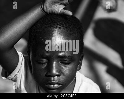 Black and white picture of african child, black children close up Stock Photo