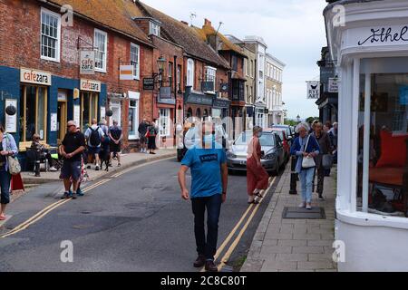 Rye, East Sussex, UK. 23 Jul, 2020. UK Weather: Visitors to the ancient town of Rye in East Sussex enjoy the warm and sunny weather. Lots of families are starting to comply with new government advise being introduced tomorrow as many wear Coronavirus masks entering the shops in the high street. Photo Credit: Paul Lawrenson-PAL Media/Alamy Live News Stock Photo