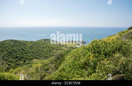 Elevated view over the Caribbean Sea coastline with rolling hills from the top of Goat Hill on St. Croix in the USVI Stock Photo