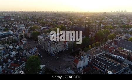 Panoramic aerial view of Amsterdam in Netherlands, Europe. View above old centre district. Famous places and typical dutch architecture. Stock Photo