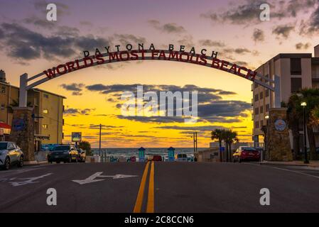 Daytona Beach, Florida, USA - January 9, 2020 : Daytona Beach welcome sign stretched across the street at sunrise. Daytona is known as The World's Mos Stock Photo