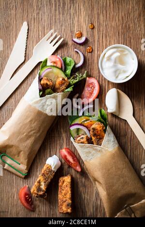 Southern fried tofu wraps with salad and dips Stock Photo