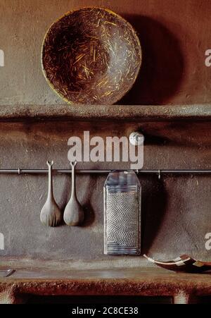 Dining room, country style, counter and wall clay and straw. Stock Photo