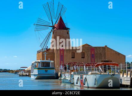 Trapani Italy - August 13, 2016: Imbarcadero Salina Infersa where you take the ferry that transports tourists to the island of Mozia, Sicily. Stock Photo
