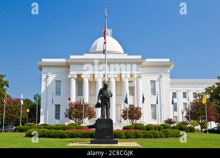 The Alabama state capitol building Montgomery, AL, USA. Statue to fallen police officers, 'Duty Called' Memorial, Stock Photo