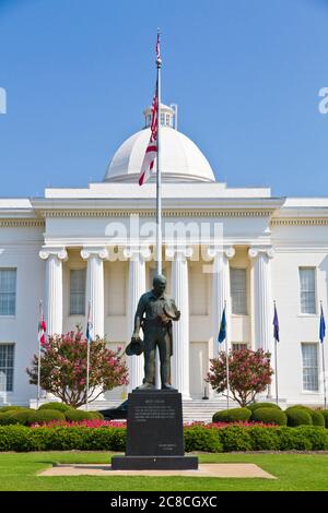 The Alabama state capitol building Montgomery, AL, USA. Statue to fallen police officers, 'Duty Called' Memorial, Stock Photo